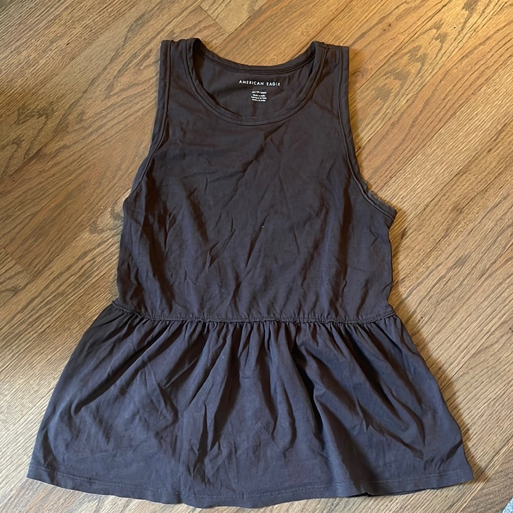 Woman’s Peplum Tank